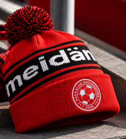 Red Football Club Beanie on Concrete